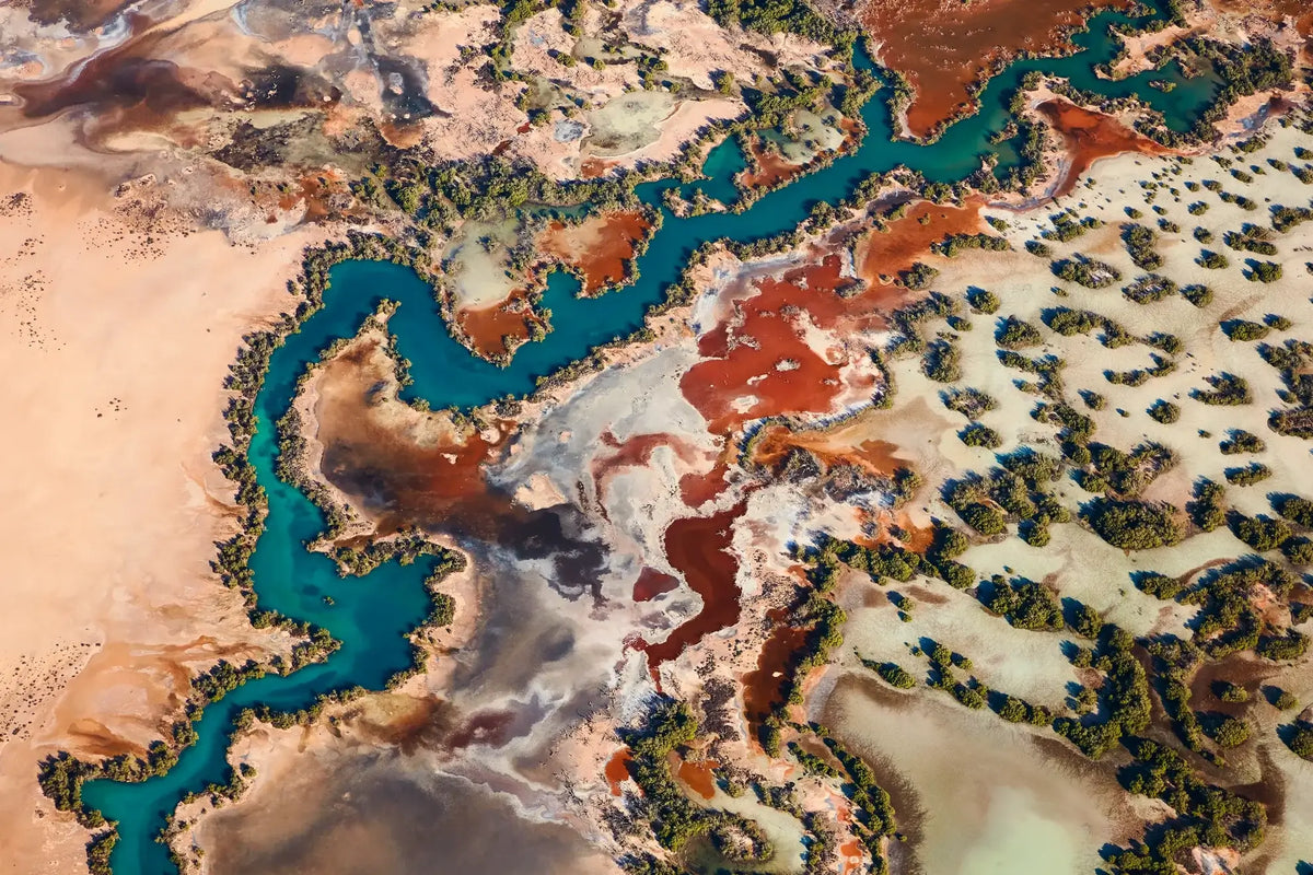 Blue Dragon – aerial photograph by Steven Manolakis, showing a winding blue tidal channel resembling the form of a dragon in Western Australia