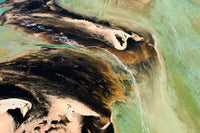 Contentment aerial art, Shark Bay, WA. Painterly confluence of pale aqua water and dark tidal flats.